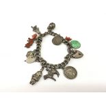 A silver charm bracelet.Approx 46.5g - NO RESERVE