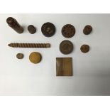 A collection of treen items to include small containers and a cigarette case.