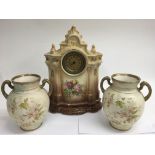 An Edwardian China clock and pair of decorative vases, a/f - NO RESERVE