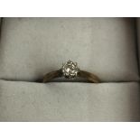 An 18ct gold diamond solitaire ring.Approx M