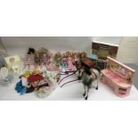 A collection of 1980's Sindy dolls and furniture
