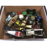 A small collection of die cast vehicles.