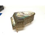 A small grand piano musical trinket box with applied panels depicting rococo style art. With figures