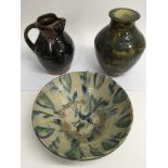 A studio pottery tenmoku glaze jug, a vase with in