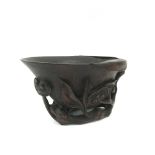 A Chinese, carved bamboo libation cup.Approx 9x15cm