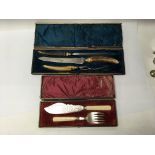 A Victorian three piece carving set with bone handles and HM silver rims in a fitted case, and a