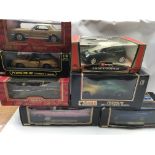 A collection of boxed Diecast 1:18 scale vehicles including Mira, Maisto etc