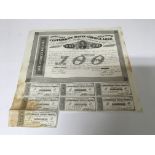 An American bond for $128 dollars with a Sotheby’s certificate of authenticity, indicating the