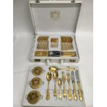 A gold plated, Soligen cased cutlery set