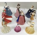 A similar lot of nine smaller size Doulton and. Coalport ladies
