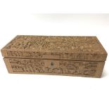 A carved wood sandalwood Chinese trinket box early 20th Century profusely carved with figures and