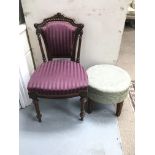 An upholstered chair with purple striped material alongside an upholstered foot stall on four legs.