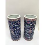 A pair of Chinese style vase with floral decoration on blue ground.Approx 28cm - NO RESERVE