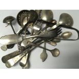 A collection of silver cutlery including 18th Century folks Continental spoons sugar sifter and