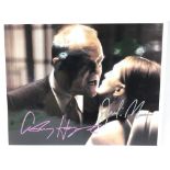 A signed photo of Anthony Hopkins and Julianne Moore, signed by both, of them starring in the 2001