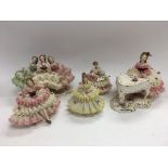 Five Dresden lacework figures of ladies and an Oriental tea service.