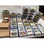 A collection of boxed Oxford diecast vehicles including Buses, Ice cream vans and some mail away