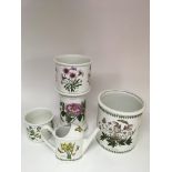 Three Portmeirion 'Botanic Garden' pattern china planters, a stand and watering can