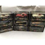 A collection of boxed Burago 1:18 scale Diecast vehicles x9