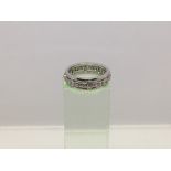 An 18ct white gold diamond eternity ring, approx 7g and approx size J-K.