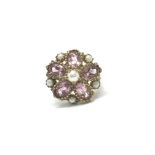 A ladies 9ct gold ring set with pearls and pink st