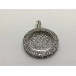 A 9ct white gold pendant, approx 3ct and approx 16.13g.