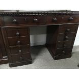 A small Victorian mahogany pedestal desk fitted with six drawers