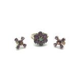 A pair of gold earrings set with garnets plus a 9ct gold ring set with garnets and emeralds,