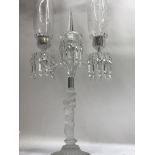 A baccarat glass two branch candelabra with detachable shades glass drops on a figural column 62 cm