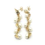 A pair of interesting 14ct gold and Japanese cultured pearl earrings. Total weight approximately 5.7