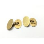 A pair of 18ct gold cufflinks, total weight approx 9.5 grams.