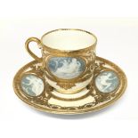 A rare Minton Porcelain cup and saucer attributed to Marc Louis Solon pate-sur-pate Neo Classical
