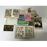 A collection of postcards, stamps, an England V Yugoslavia programme, a card counter, a West Ham