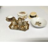 A collection of miniature porcelain comprising a hand painted Royal Worcester dish Derby cup and