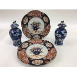 A pair of Chinese blue and white vases and pair of Imari plates.Approx 16cm high and 21cm diameter -