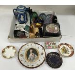 A small collection of paperweights and decorative ceramics