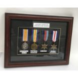 A framed WW1 and WW2 medal group