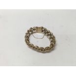 A 9ct gold bracelet with a double open link design. Weight approx 21.5g.