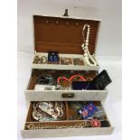 A box of costume jewellery including silver