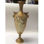 A large Royal Worcester porcelain vase hand painted and with raised mask handles. Height 38.5cm no