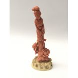 A Quality late 19th or early 20th Chinese Century Carved coral figure the goddess of Mercy the