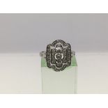 A 9ct white gold Art Deco style diamond cluster ring, approx 3.2g and approx size O.