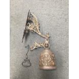 An old heavy brass Angelis bell. Height approx 50cm.