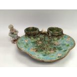 A Victorian majolica dish (a/f) and a Continental ceramic figure (2) - NO RESERVE