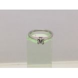 An 18ct white gold princess cut solitaire diamond ring, approx 3g and approx size N.