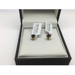 A pair of 14ct gold and black diamond ear studs, approx 1.5g.