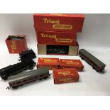 A small collection of tri-ang railway including engines tenders and wagons