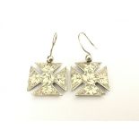 A pair of Victorian silver cross shaped earrings.