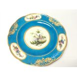 A Severs18th Century Porcelain plate decorated with exotic birds and panels of flowers with