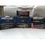 A collection of boxed Diecast 1:18 scale vehicles including Revell, Mondo etc